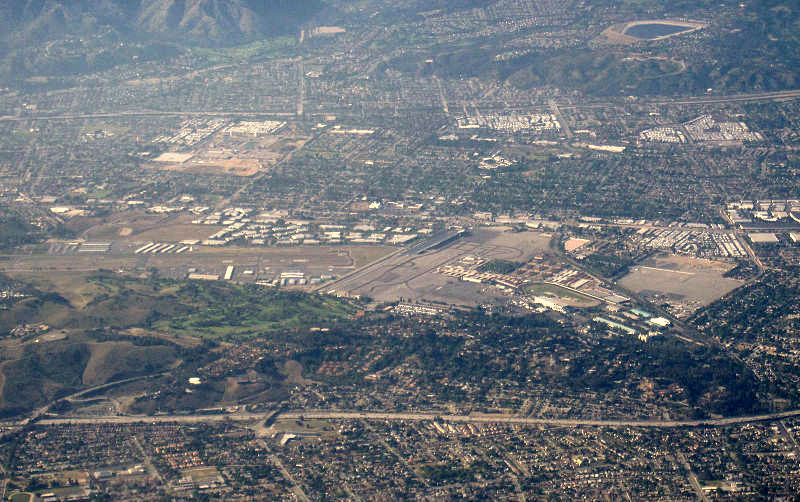 Aerial view of Pomona and the Fairplex fairgrounds in the Inland Valley with the San Gabriel foothills behind