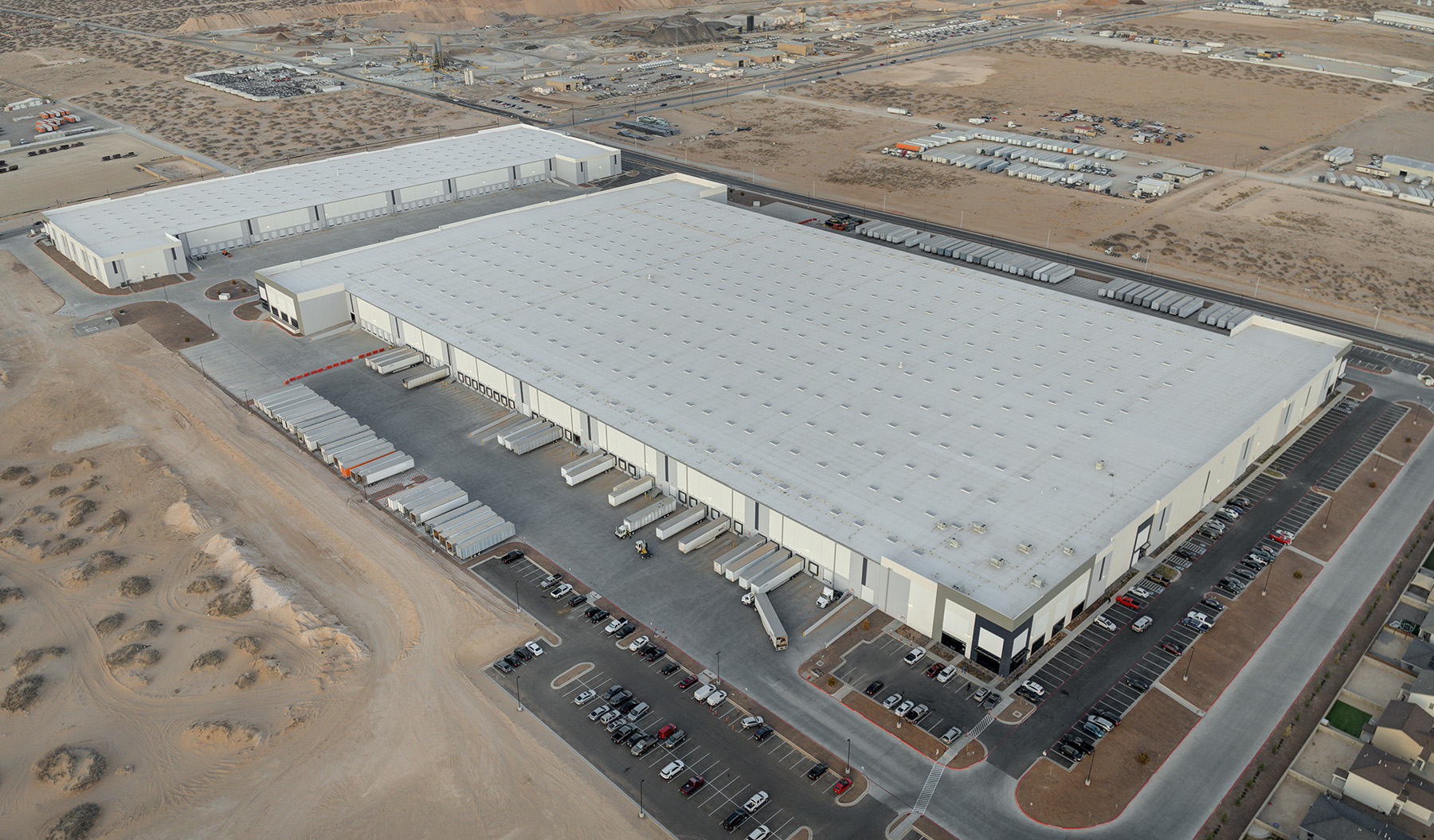 Large desert warehouse and distribution complex under construction near Gilbert served by a mobile drinking water station