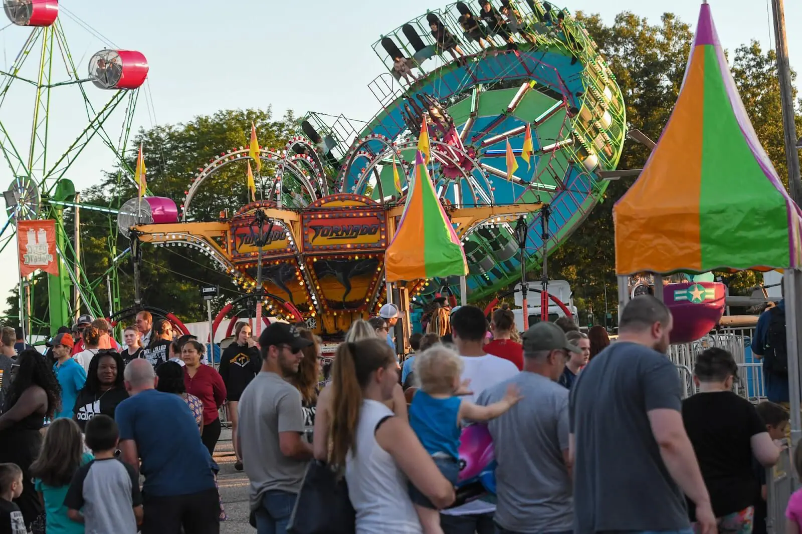Summer carnival and fair crowd in Orem Utah at an evening community event served by mobile hydration
