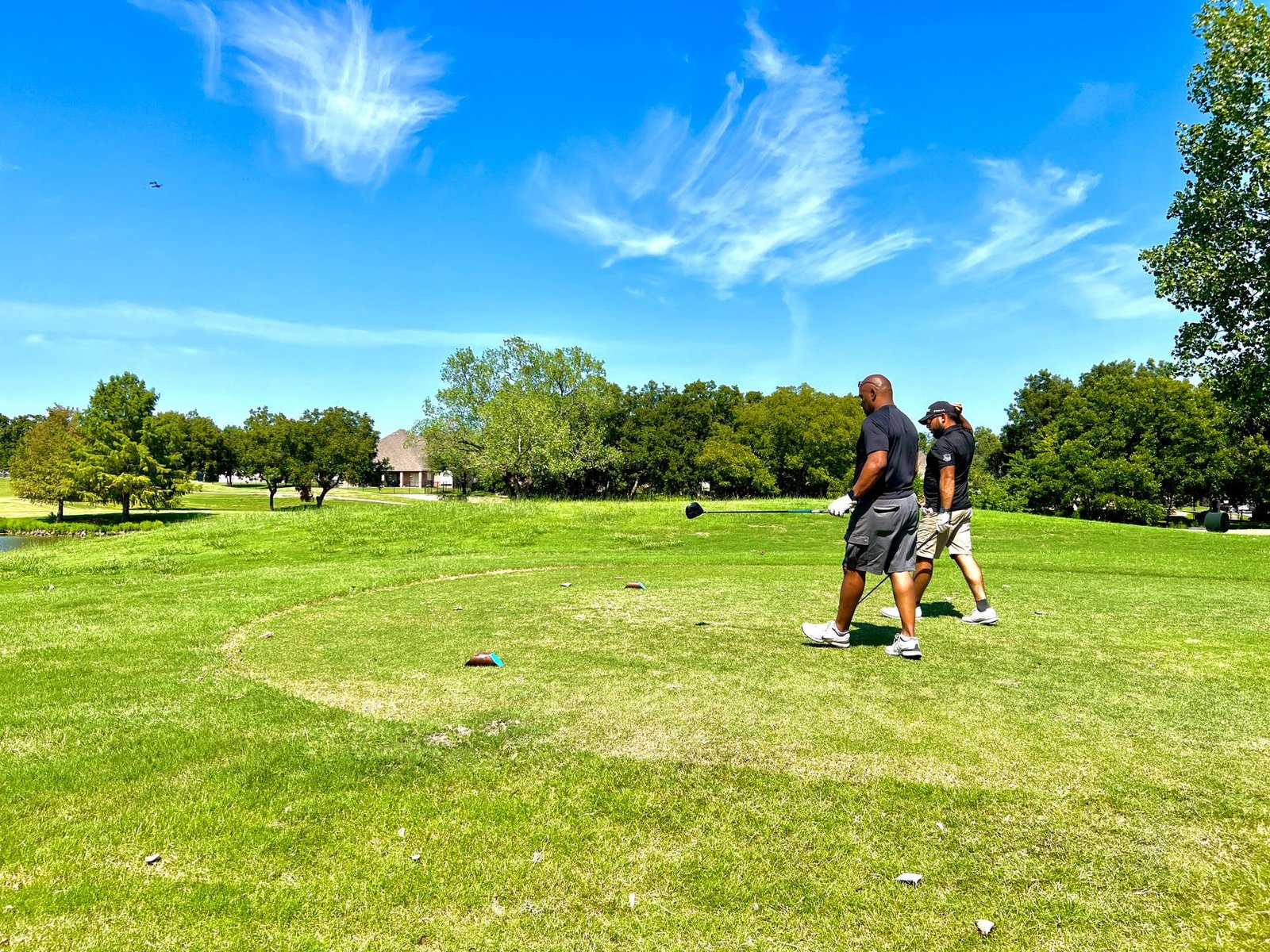Golfers on a course in a 55-plus community setting